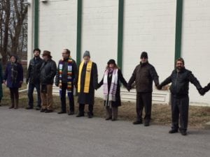 Clergy from all faiths joined hands with others to show unity with the Muslim community Friday at the Louisville Islamic Center. (photo by Lee Chottiner) 